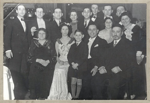 Family Reiss (circa 1938) Back row: Brothers Morry, Solly, Charlie, Alf, Joe & my grandfather Sam (separated by Alf's wife Bella & bar mitzvah Lionel Becker). Middle row: My mother Norma & grandmother Leah. Front row: My great-grandmother & grandfather Chana & Naftali, flanking Reiss sister Sadie, her husband Jack & son Alan Becker.